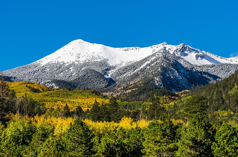 Flagstaff AZ in the autumn and the snow-covered San Fransisco Peaks
