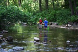 Kids keeping cool in the summer at shady West Fork Trail, Sedona, AZ